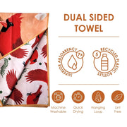 Dual-sided towel with cardinal design, featuring sustainability icons and text.