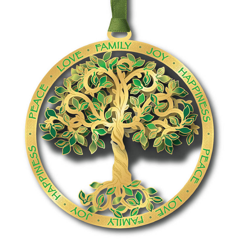 Decorative tree ornament with green leaves and gold trunk on white  background.