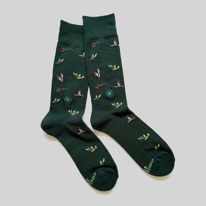 green crew socks featuring woodpeckers and berries 