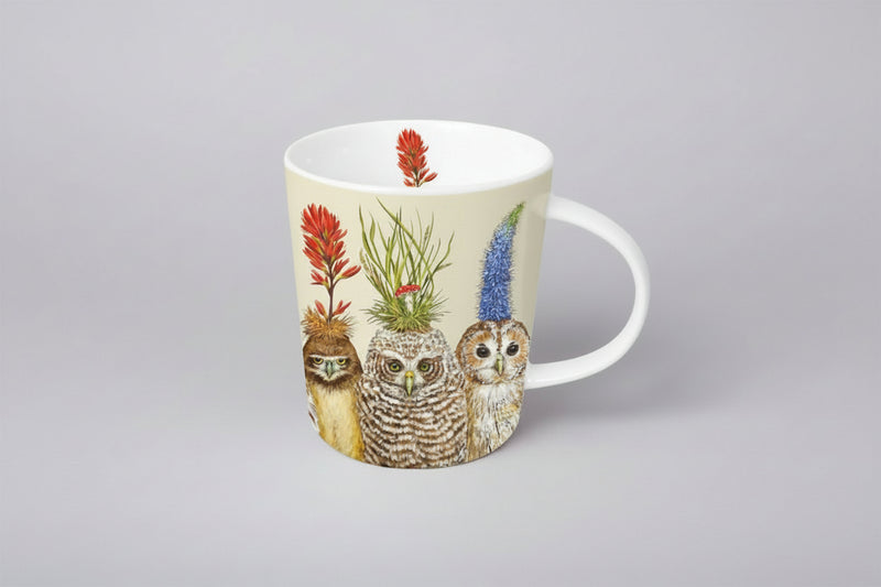 mug with owls wearing flower hats on a gray background

