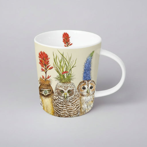 mug with owls wearing flower hats on a gray background
