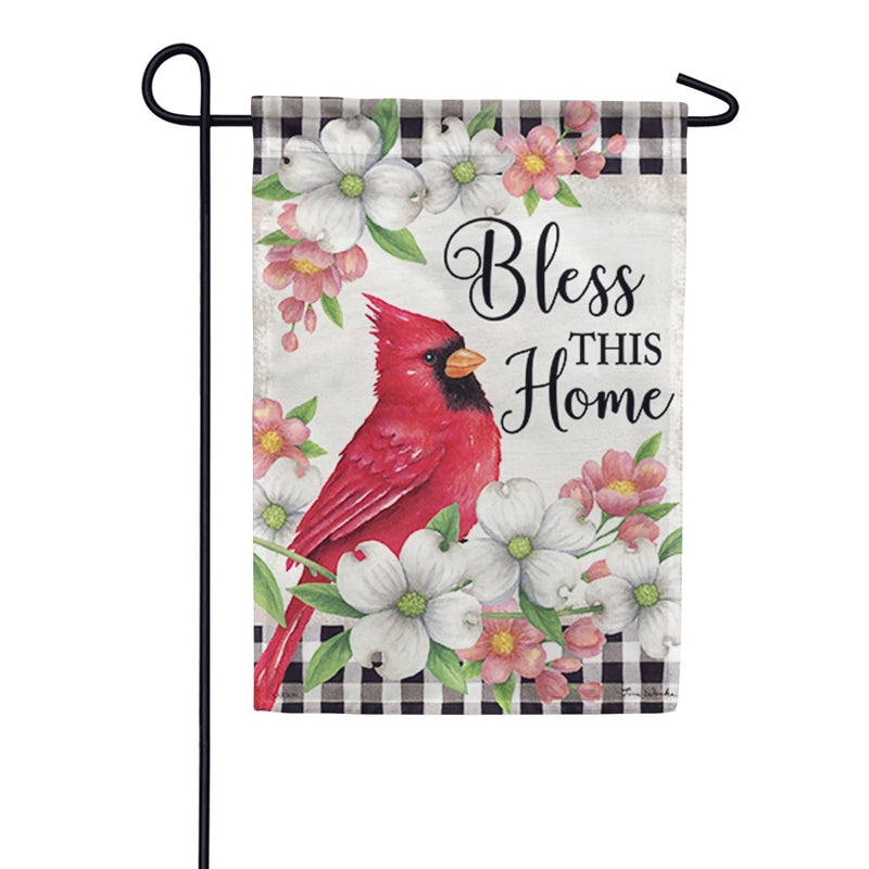 Decorative garden flag with a red cardinal, dogwood flowers, and 'Bless This Home' text on a checkered background.