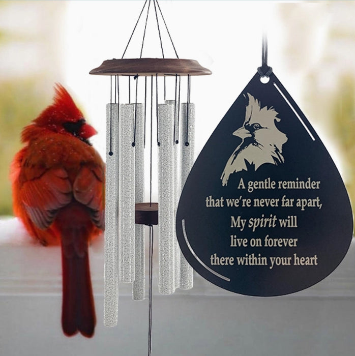 Cardinal Memorial Wind Chime shown with real male northern cardinal