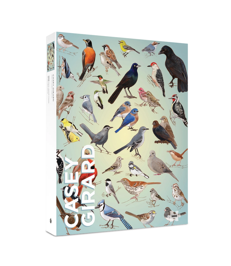 Puzzle box featuring illustrations of various birds by artist Casey Girard.