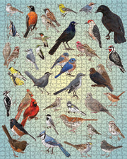 Jigsaw puzzle with various birds on a light blue background