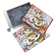 Chickadee Tea 275pc Puzzle
puzzle pieces in a box with the puzzle image on the size