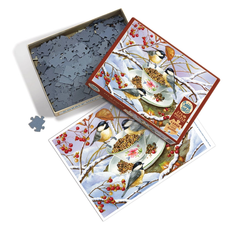 Chickadee Tea 275pc Puzzle
puzzle pieces in a box with the puzzle image on the size