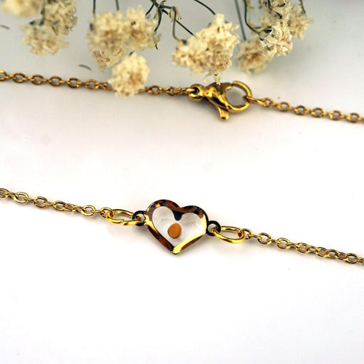 Mustard Seed heart necklace with delicate white flowers