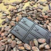 Dark chocolate bar and cocoa beans