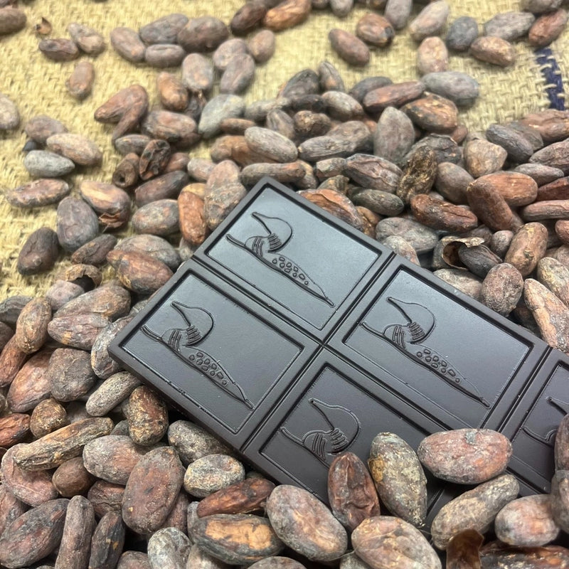 Dark chocolate bar and cocoa beans