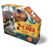 Boxed dinosaur-shaped jigsaw puzzle featuring a T. Rex with colorful design elements.