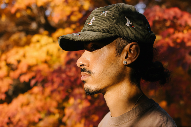 guy wearing the Ducks Corduroy Hat
autumn foliage in the background