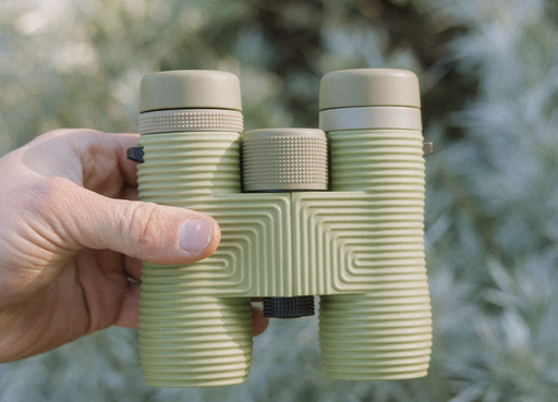 Field Issue 10Xx32mm Binoculars in hand