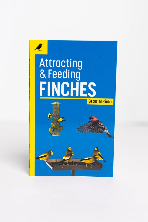 Book cover of 'Attracting & Feeding Finches' by Stan Tekiela with illustrations of birds and a bird feeder on a blue background.