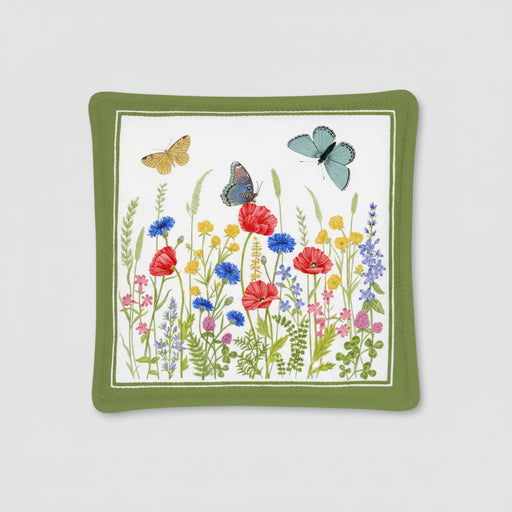 Decorative square pillow with floral and butterfly design on a white background