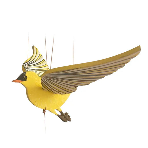 Yellow goldfinch mobile with outstretched wings on a white background