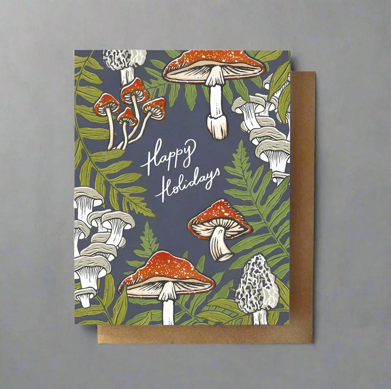 Greeting card example with mushroom design and 'Happy Holiday' text on a blue background
