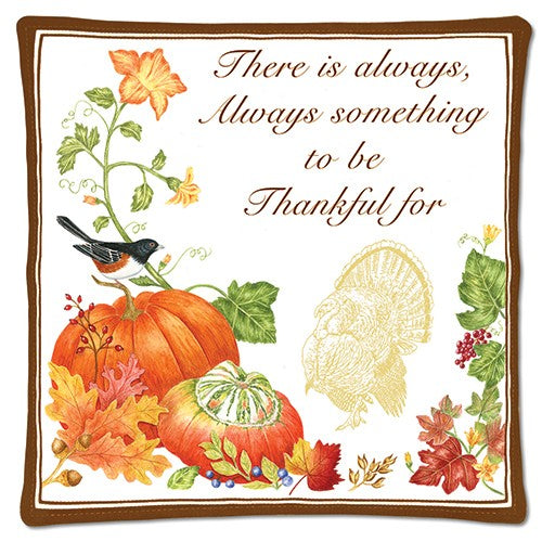 Decorative hot pad with pumpkins, leaves,  a bird and a turkey illustration, featuring a Thanksgiving message.