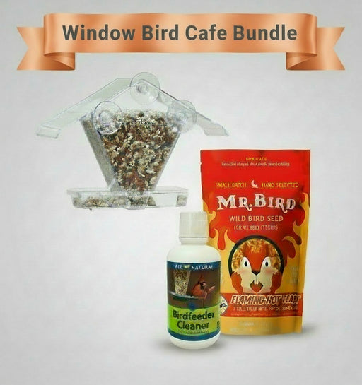 Window bird cafe bundle with bird feeder, seed, and cleaner on a light gray background