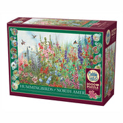 Cobble Hill puzzle box featuring a garden scene with flowers and birds on a white background