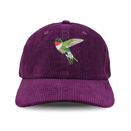 Purple corduroy cap with a hummingbird design on a white background