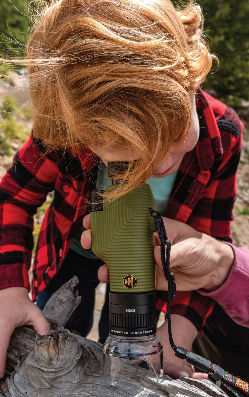 child using the inspector microscope attachment with zoom tube monocular