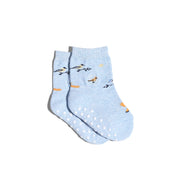 Light blue socks with white grippy dots and bird designs 