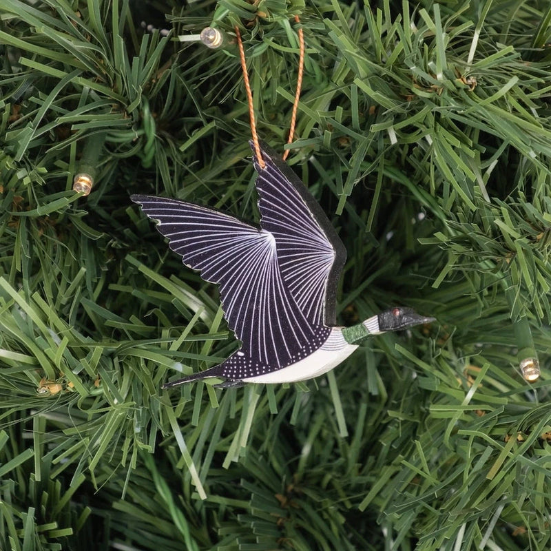 Decorative loon ornament on a Christmas tree
