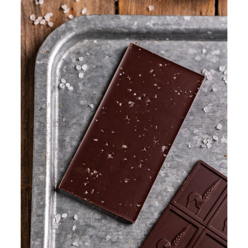 Chocolate Bar - Dark Chocolate with Maine Sea Salt on a tray with scatter sea salt