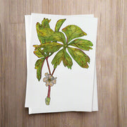 Card with green leaf design on a sage background