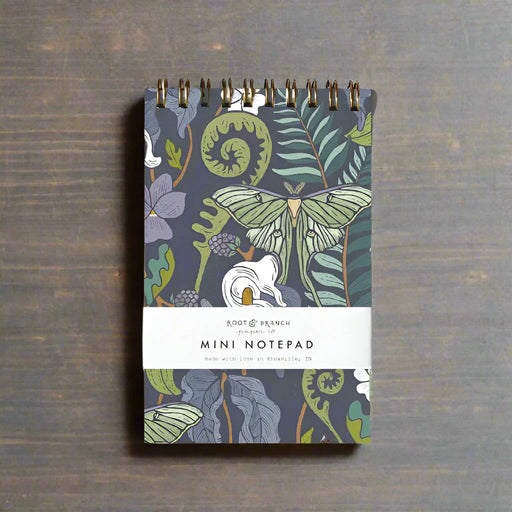 Mini notepad with nature-themed design on a natural background