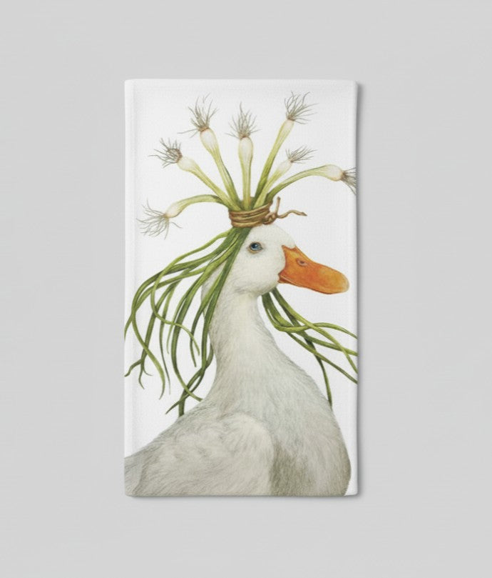 Kitchen/Bar Towel with white goose design wearing a green onion flowing hat on a white background