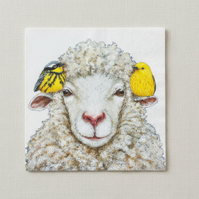 Lunch size napkin featuring a white sheep and two yellow birds perched on either ear.