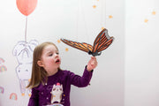 Monarch Butterfly Flying Mobile
little girl playing with the mobile