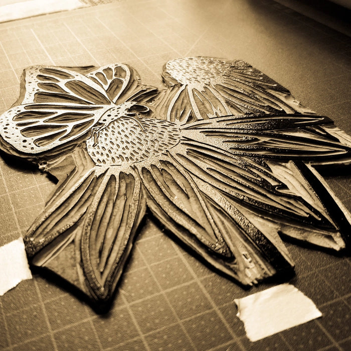 Monarch on Echinacea Linocut Card - carving process