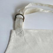 Fronds Organic Apron
brass hardware