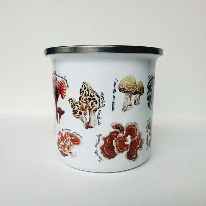 Enamel mug with mushroom illustrations on a white background