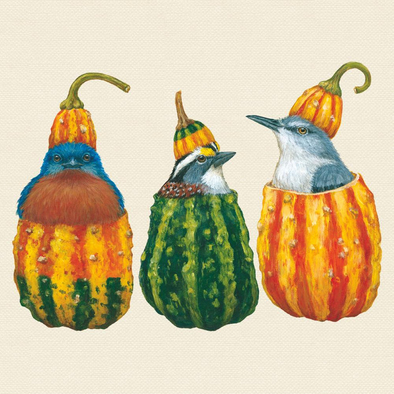 Three birds inside gourds on a beige background