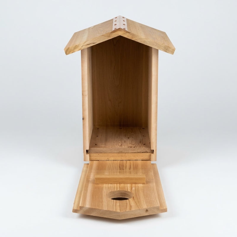 Screech Owl Nesting Box -  Western Red Cedar
interior of nesting box with drainage holes and groves cut for fledgling climbing assistance 