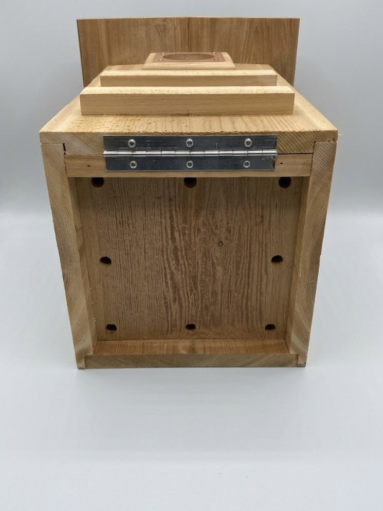 Screech Owl Nesting Box -  Western Red Cedar
base of nesting box with drainage holes
