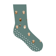 Teal Green sock with owl pattern on a white background