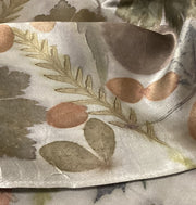 Silk scarf with floral pattern on a white background