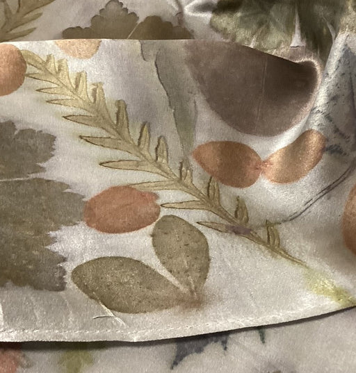 Silk scarf with floral pattern on a white background