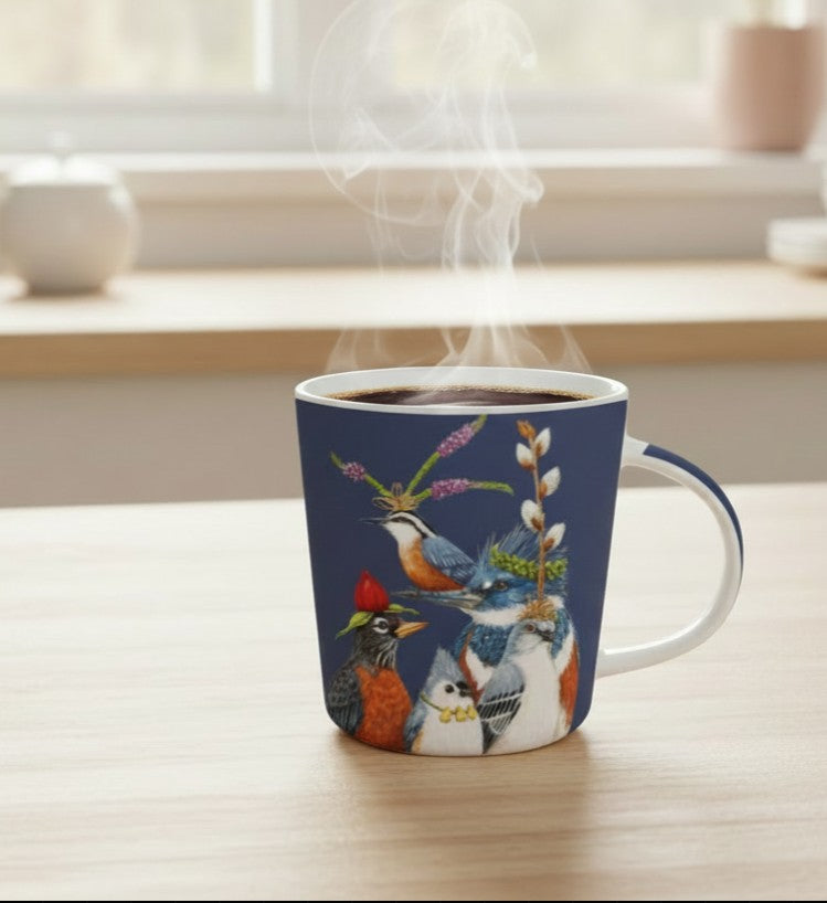 mug with featuring birds full of hot coffee on a countertop