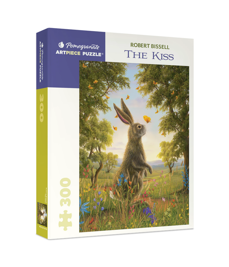 Pomegranate Artpiece Puzzle box featuring a rabbit illustration titled 'The Kiss' by Robert Bissell.