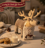 Toy reindeer with a 'Reindeer Feed' bag on a table with cookies and milk, Christmas-themed text above.