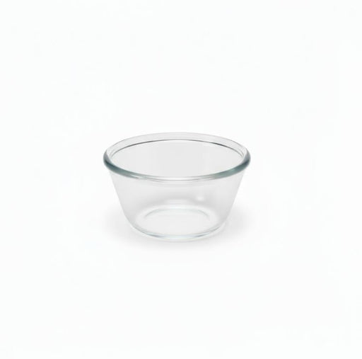 Clear glass dish on a white background