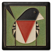 Decorative tile with geometric rose breasted grosbeak design on a green background