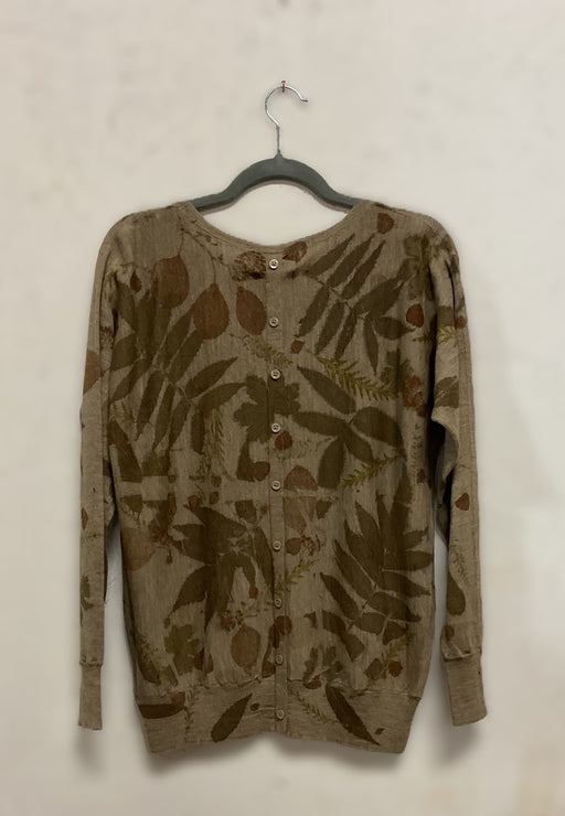 Floral-patterned Merino Wool Sweater  on a hanger against a plain background - back