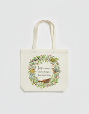 Tote bag with bird design and text on a white background